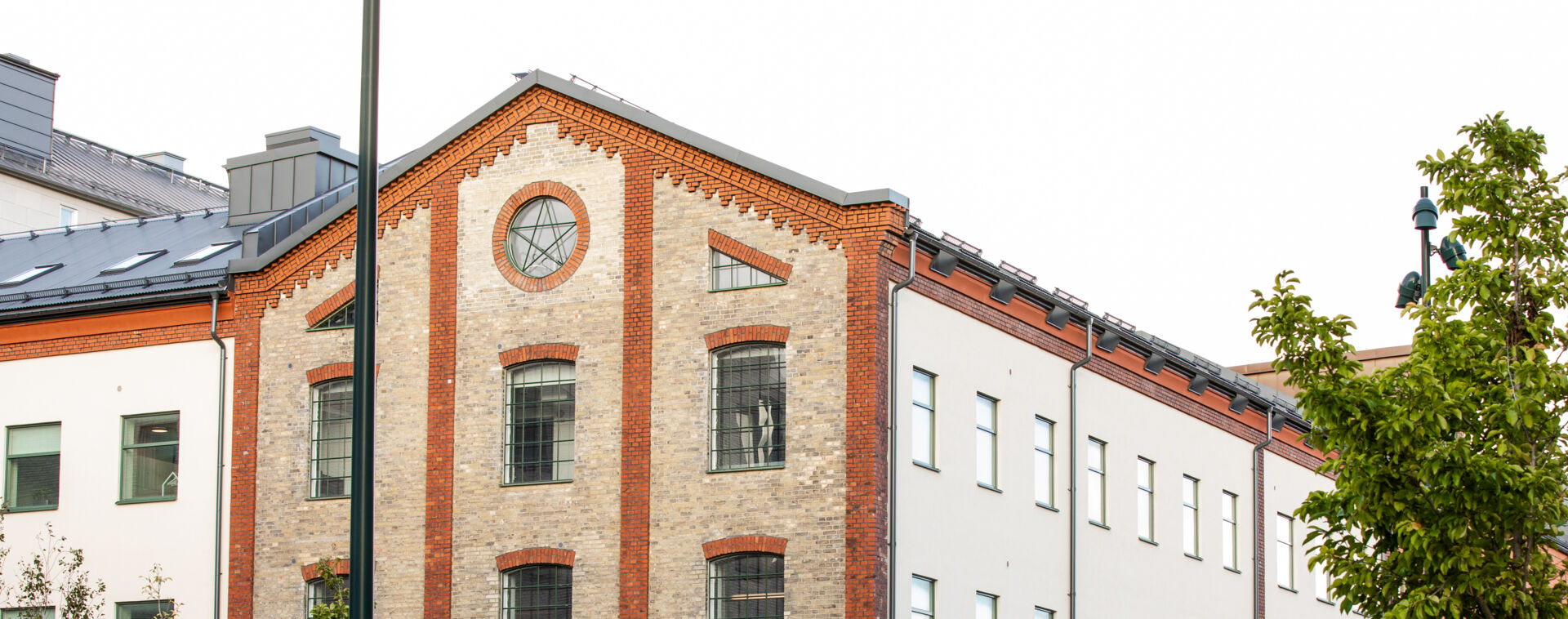 Red brick-building with large windows, Raffinaderiet in Lund.